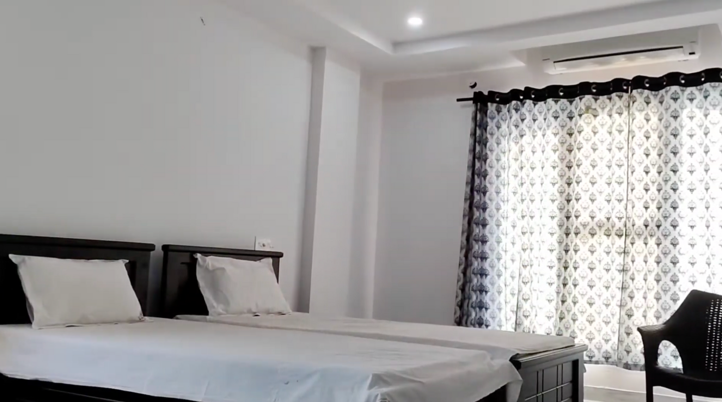 Triple Sharing (Per Devotee) - Shared room for three devotees - Air Conditioned