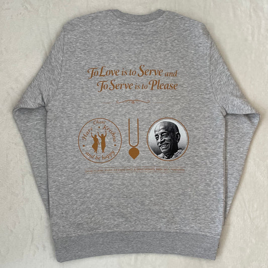 Gray sweatshirt with brown text and graphics on a beige background